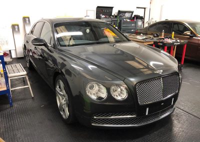 Bentley Flying Spur wrapped in Avery Satin Pearl White - Image 01