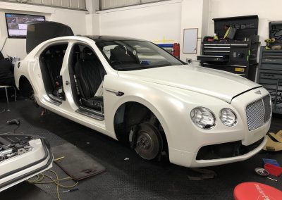 Bentley Flying Spur wrapped in Avery Satin Pearl White - Image 03