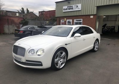 Bentley Flying Spur wrapped in Avery Satin Pearl White - Image 18
