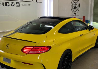 Mercedes C63 wrapped in Oracal Yellow with Edition One stripe