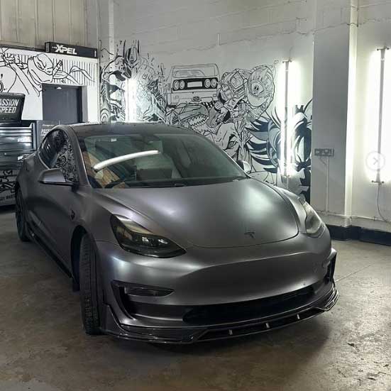 A model 3 Tesla wrapped in 3M satin grey