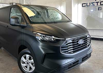 Ford Transit Custom Wrapped in 3M Matte Black With Logo